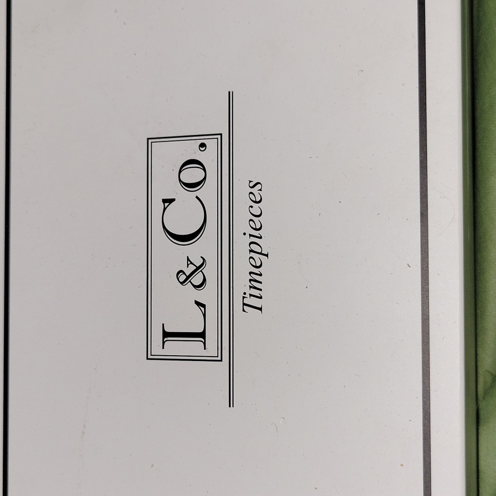 Watch, earrings and necklace set.